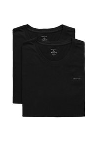 To svarte bomull t-skjorter med rund hals. GANT-logoen trykt i grått på venstre side av brystet. Jevn tekstur, vanlig passform.
