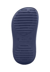 Granatowa gumowa podeszwa buta z teksturowanymi rowkami zapewniającymi przyczepność, z zaokrąglonym noskiem i gładkim konturem, oznaczona rozmiarem oraz szczegółami produkcji.