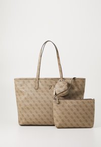 Beige tote bag with geometric logo pattern, two long handles, and a shiny hardware detail. Includes a small matching pouch and zippered case.