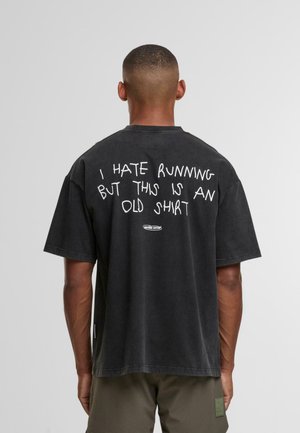 T-shirt med print - black