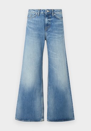 Lyseblå denim flared jeans med høy liv, fem lommer, subtil falming og brodert merke over baklommen.