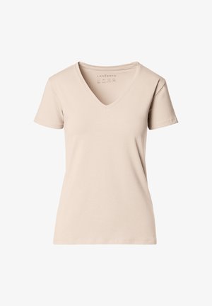 Beżowa damska koszulka z krótkim rękawem i dekoltem w serek, o prostym, dopasowanym kroju i gładkiej fakturze materiału na białym tle.