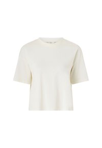 T-shirt crème, à manches courtes, en coton doux. Caractéristiques : encolure ronde et coupe décontractée avec un design minimal.
