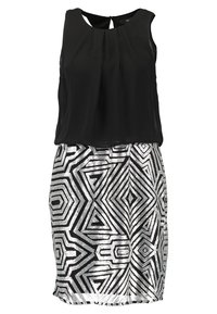 Top negro sin mangas con un escote plisado, combinado con una falda negra hasta la rodilla que presenta patrones geométricos de lentejuelas plateadas.