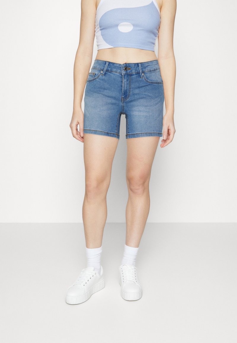 Vero Moda Villa mid-rise tie waist denim bermuda shorts in light