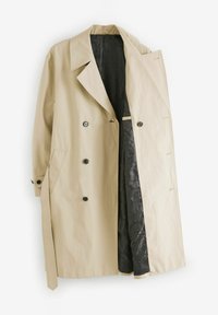Manteau trench beige à double boutonnage avec une doublure noire texturée, présentant de grands revers, deux poches latérales et des boutons noirs.
