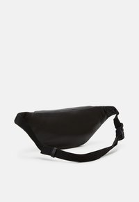 Calvin Klein Jeans MONOGRAM SOFT WAISTBAG UNISEX - Torbica za okoli pasu - black
