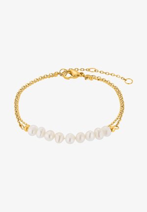 Goldenes Armband mit einer Reihe von weißen Perlen, die eine glatte Textur aufweisen, mit einem Klappverschluss und einer verstellbaren Kette.