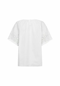 Top corto bianco a maniche corte realizzato in cotone. Presenta dettagli ad occhiello intricati sulle maniche e bordi ondulati. Vestibilità semplice e rilassata.