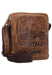 Brown leather messenger bag with embossed motorcycle design, decorative text, and a brown fabric strap, featuring zippered compartments and stitching details.