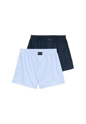 Herenboxers in blauwe gestreepte stof en effen navy katoen. Voorzien van een elastische tailleband en knoopsluiting aan de voorkant van de gestreepte variant.