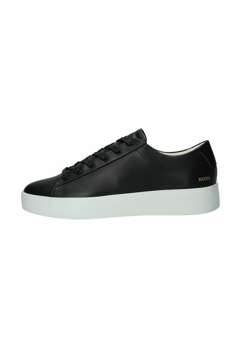 Black leather sneaker with a smooth finish, white rubber sole, six eyelets, and subtle branding in gold on the heel.