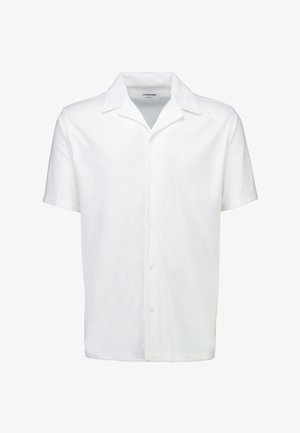 Camicia bianca a maniche corte con bottoni e colletto classico, realizzata in morbido tessuto spugna, mostrata su uno sfondo bianco uniforme.