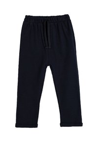 Pantalones de punto azul marino con cintura elástica y cordón. Cuenta con bolsillos laterales y dobladillos enrollados. Textura suave y diseño ajustado.