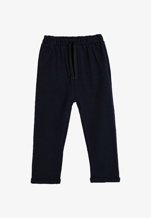 Marineblaue Strickhose mit elastischem Bund und Kordelzug. Verfügt über Seitentaschen und aufgerollte Säume. Weicher Textil und figurnahe Passform.