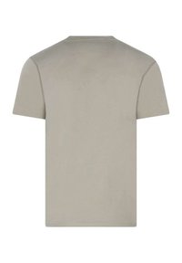 Camiseta de algodón color beige claro con cuello redondo clásico, mangas cortas y una textura suave; sin gráficos ni patrones en la parte de atrás.