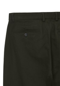 Pantalons vert foncé en tissu texturé. Dotés d'une fermeture à bouton, de passants de ceinture et d'une poche arrière avec un détail de bouton.