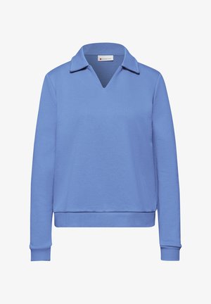 Jersey de manga larga azul claro con cuello en V y puños y dobladillo acanalados, mostrado sobre un fondo blanco liso.