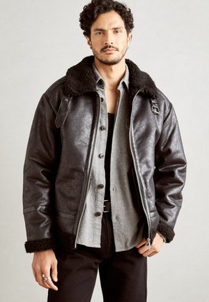 FAUX SHEARLING JACKET - Faux leather jacket - black