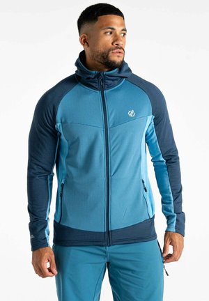Blaues Zip-Hoodie aus einer Mischung aus strukturierten und glatten Stoffen. Verfügt über Seitentaschen, einen hohen Kragen und kontrastierende marineblaue Ärmel.