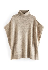 Bež turtleneck pončo sviiter, mis on valmistatud tekstuurilisest kudumist, külgedel on taskud ja ribaga serv ning krae.