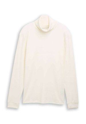 Bela dolga rokav turtleneck majica, narejena iz mehkega blaga, z ohlapnim krojem, rebrastim ovratnikom in manšetami, ter stranskimi razpoki na robu.