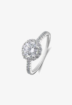 Silver engagement ring with a large round center diamond surrounded by smaller diamonds on a diamond-studded band.