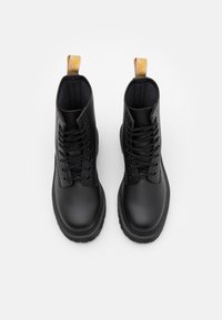 Dr. Martens Botines con plataforma - black