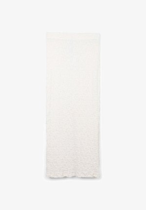 Panneau mural texturé blanc avec une surface fripée. Les bords sont légèrement irréguliers, ce qui renforce son aspect organique. Convient à différents styles de décoration.