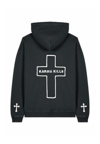 Hoodie noir avec une grande croix blanche dans le dos, portant le texte "KARMA KILLS." Des petites croix sur chaque manche. Texture douce et design décontracté.