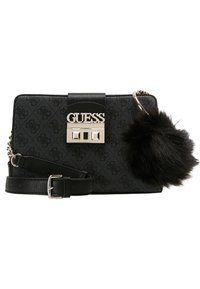 Sort syntetisk håndtaske med tekstureret overflade, metal logo hardware og aftagelig faux fur pom-pom accent. Justerbar rem inkluderet.