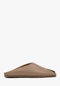 Light brown slip-on slipper with an open toe, smooth synthetic upper and textured rubber sole. Minimalist design with a subtle curve.