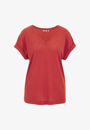 Červené tričko s V-výstřihem a krátkými ohrnutými rukávy, se strukturovaným diamantovým vzorem. Vyrobeno z měkké tkaniny s volným střihem.