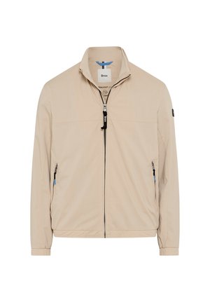Beige lightweight jacket with high collar, full front zipper, two zippered side pockets, elastic cuffs, brand tag inside collar.
