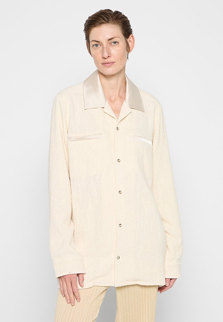 Nanushka Overhemdblouse beige Nanushka Overhemdblouse beige