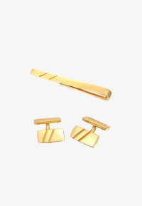 Atlasīts, gold-coloured