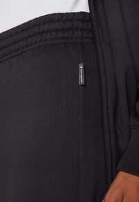 Champion ICONS TONAL LOGO SET - Treniņtērps - black