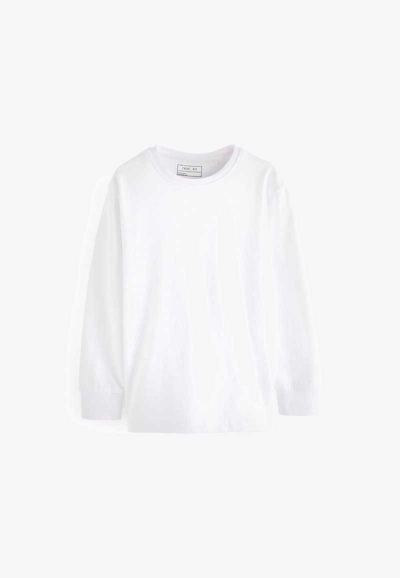Chemise blanche unie en coton à manches longues avec col et poignets côtelés, présentée sur fond blanc.