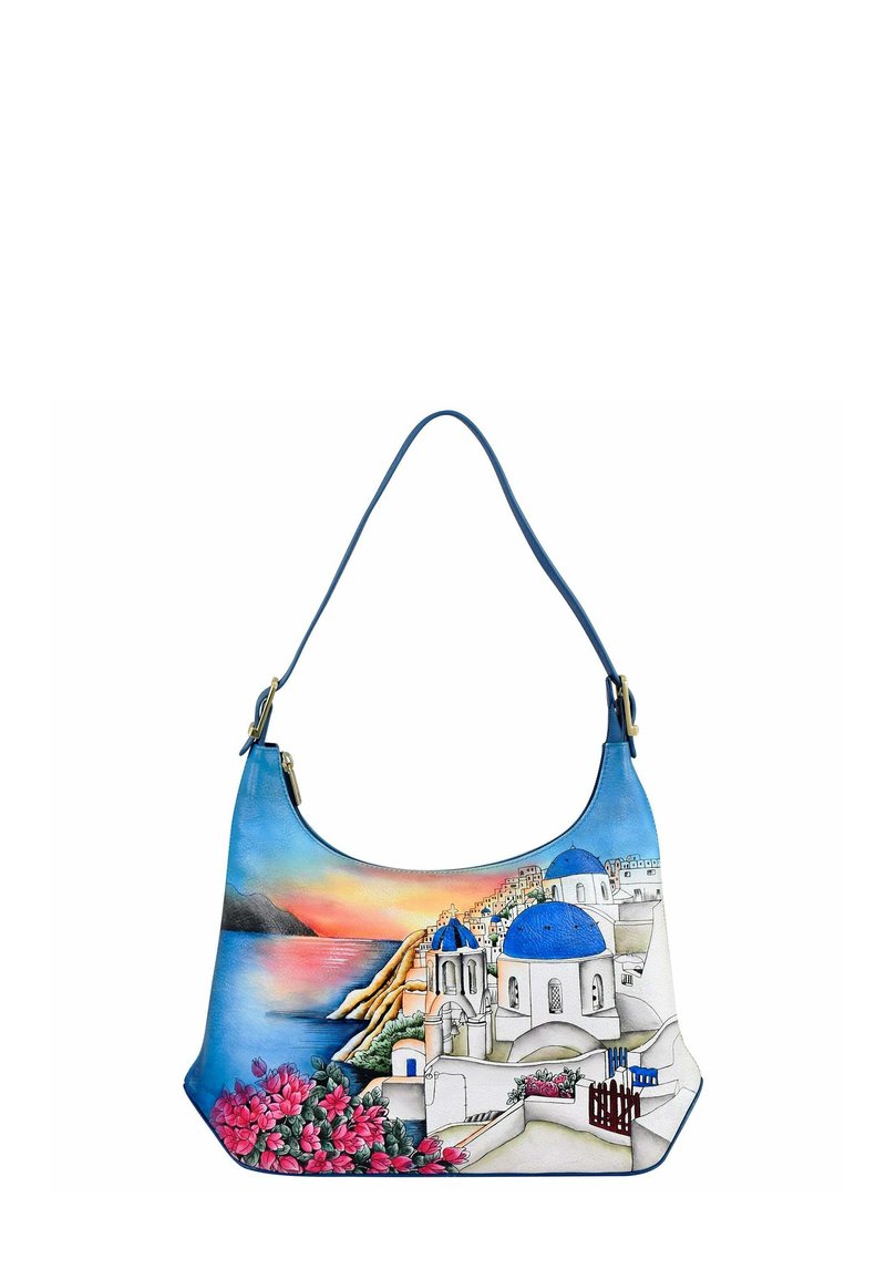 Hobo-tas met een blauwe schouderband, voorzien van een kleurrijk schilderij van kustarchitectuur en bloemen in levendige roze en blauwe tinten.