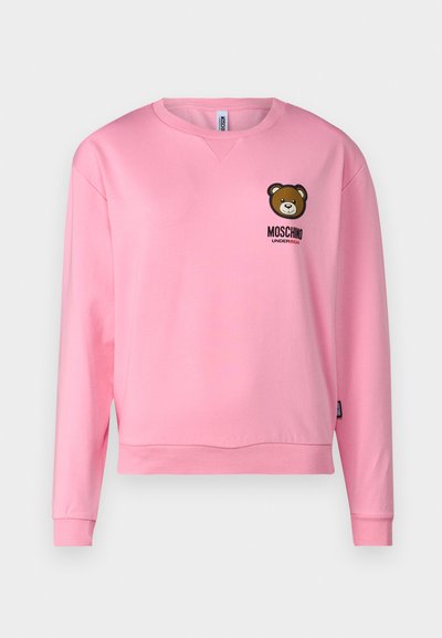 Pink sweatshirt made of soft fabric, featuring a round neckline, long sleeves, and a bear graphic on the chest with "Moschino Underbear" text.