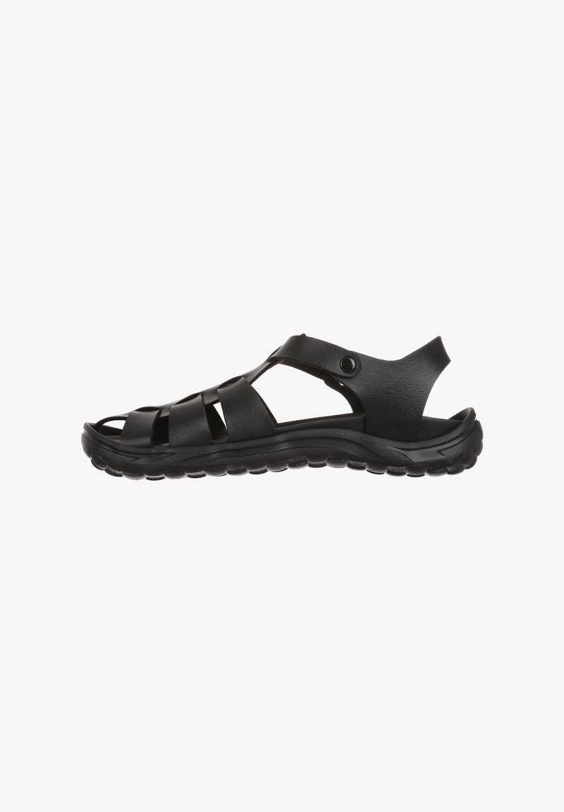 Sandal nera chiusa con toe, dotata di molteplici cinghie, suola imbottita e cinghia sul tallone con chiusura a bottone.
