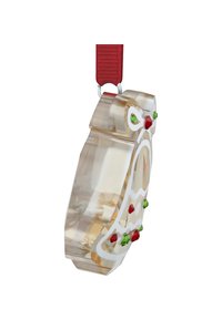 Przezroczysta zawieszka w kształcie dekoracyjnego dzwonka, z białym obrysem, czerwonymi i zielonymi ozdobami imitującymi kamienie oraz czerwonym paskiem do zawieszenia.