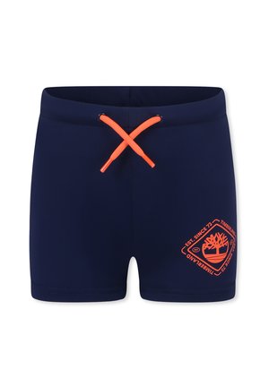 Marine zwemshorts met een oranje aantrekkoord en logo. Gladde textuur, middelhoge fit, met een bedrukking aan de onderzijde rechts.