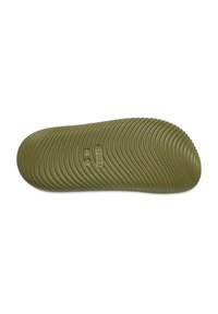 Groene rubberen zool met een gestructureerd, golvend patroon en logo, met een afgeronde neus en een iets verhoogde hak voor duurzaamheid en grip.