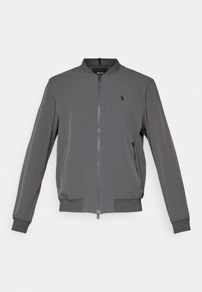 Grijze ritsjacket met een staande kraag, lange mouwen, ribgebreide manchetten en zoom, met zijzakken en een klein logo op de borst.