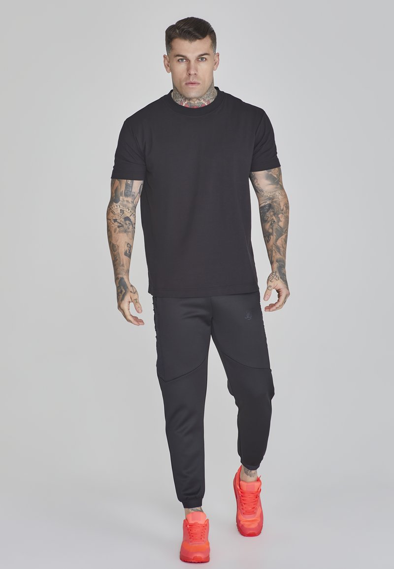 Surpantalon L&eacute;ger Imperm&eacute;able De Randonn&eacute;e - MH500 - Homme QUECHUA