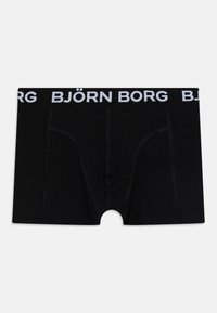 Čierne boxerky vyrobené z elastickej látky, s čiernym pásom s bielym logom "BJÖRN BORG", mäkkou textúrou a priliehavým strihom.