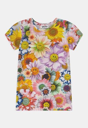 Dziecięca koszula z krótkim rękawem z dużym, kolorowym nadrukiem kwiatowym, niektóre kwiaty mają żółte uśmiechnięte buźki na kremowym tle.