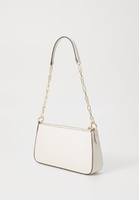 White leather handbag with a structured shape, gold chain strap, and contrasting dark edge detailing. Smooth texture, zip closure on top.