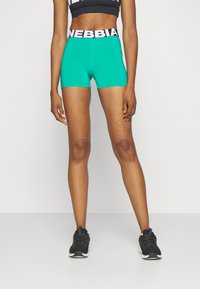 Nebbia WOMENS SHORTS - Leggingek - green